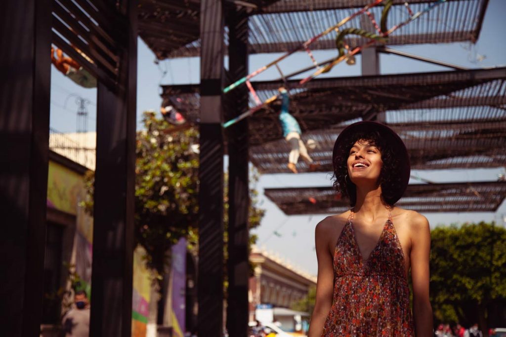 A woman walking around a new city abroad