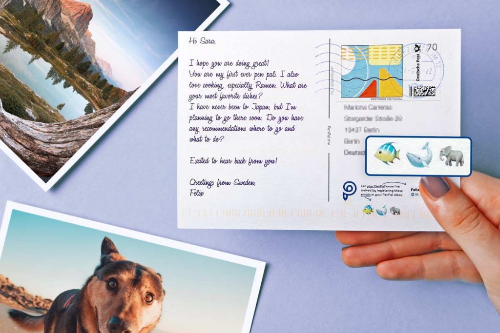 A picture highlighting how to register a pen pal postcard using the emojis amplified